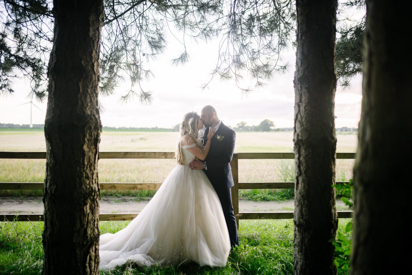 brides love to explore the woods through the doors at the back of the barn venue