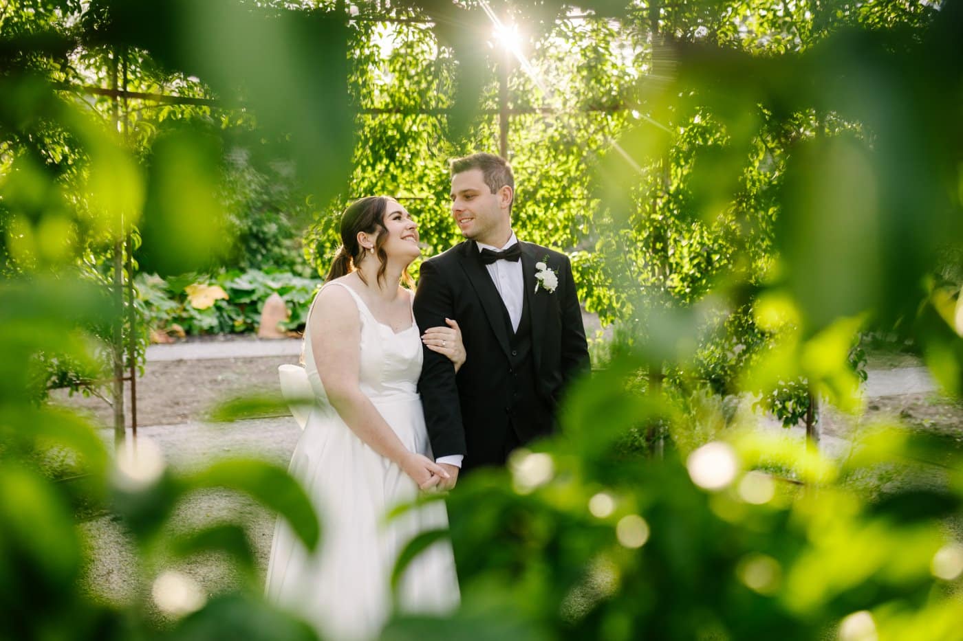 Couple in the grounds of Middleton Lodge, the fig house