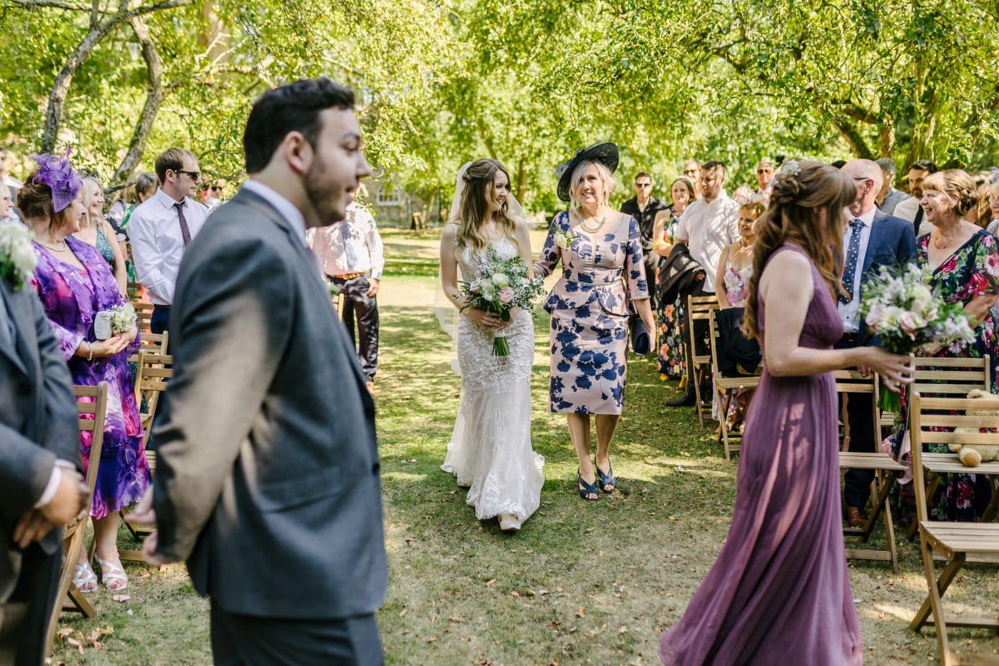 The iconic hackthorn walled garden offers a breathtaking backdrop for a radiant wedding and striking weddings scene under clear skies.