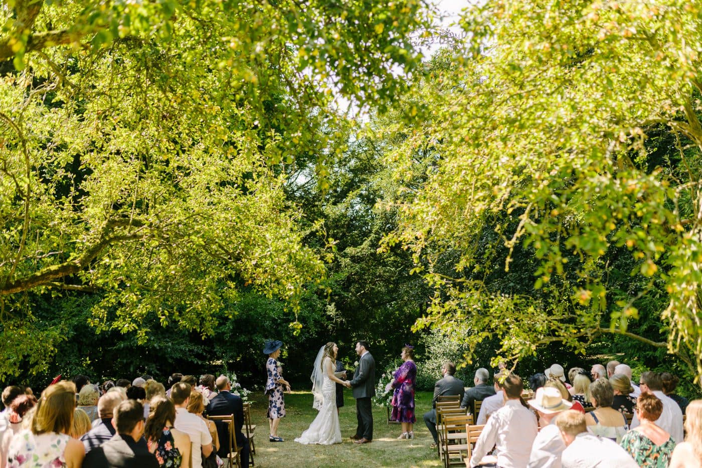 Set against the historic hackthorn walled garden, a graceful wedding and picturesque weddings scene unfolds in timeless elegance.