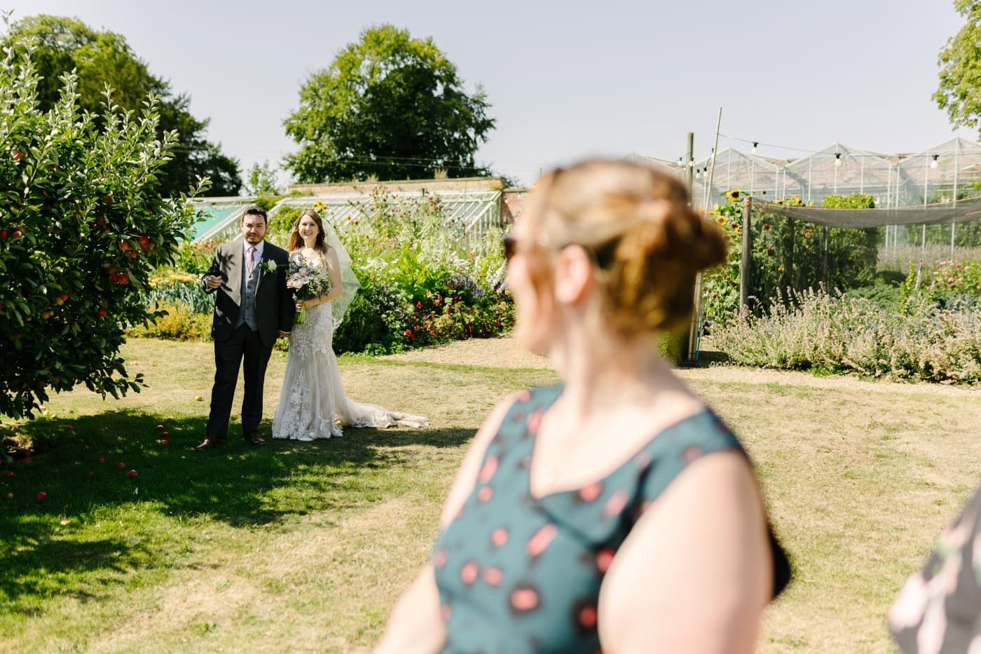 A moment of quiet reflection unfolds as the couple shares laughter and tender glances in a picturesque setting.