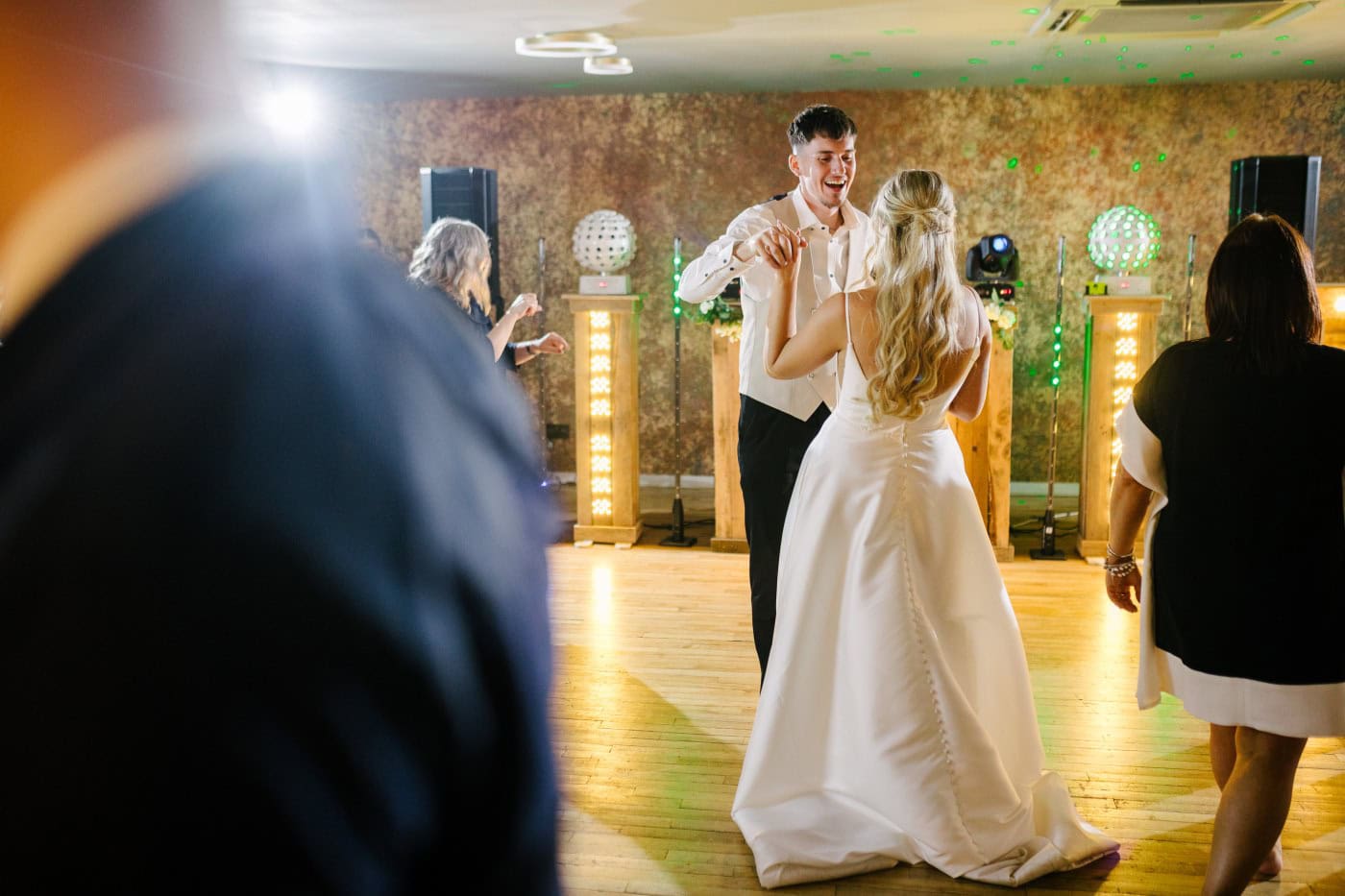 A peaceful ceremony unfolds in the historic hall.