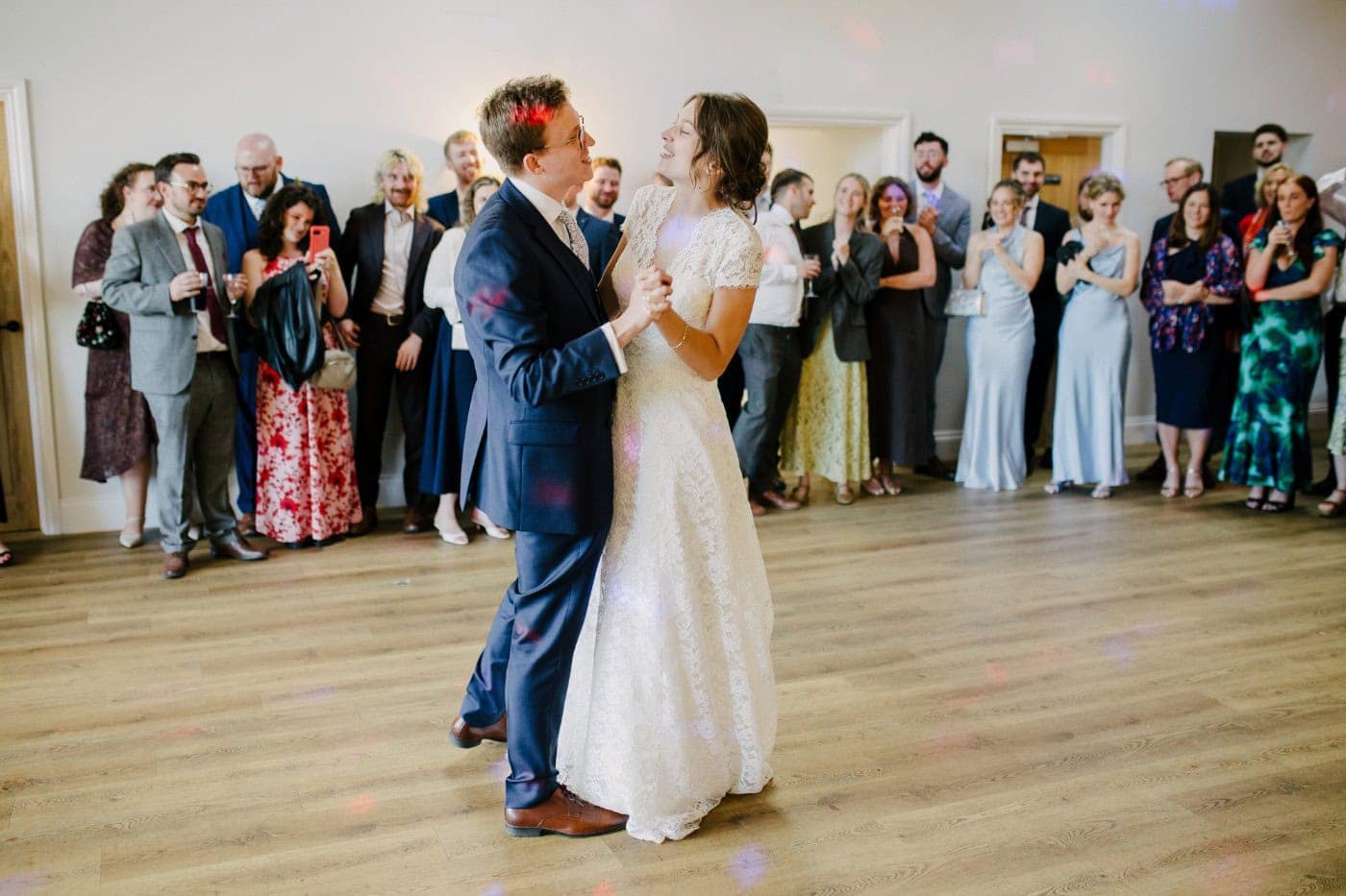 First dance at Danby Castle in the stone barn under the chandeliers