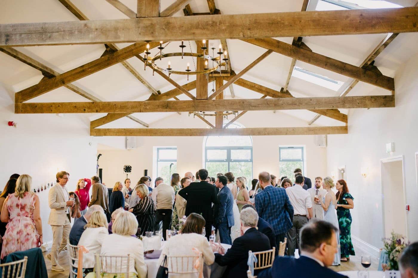 Packed dance floor in the barn at Danby Castle at the evening party