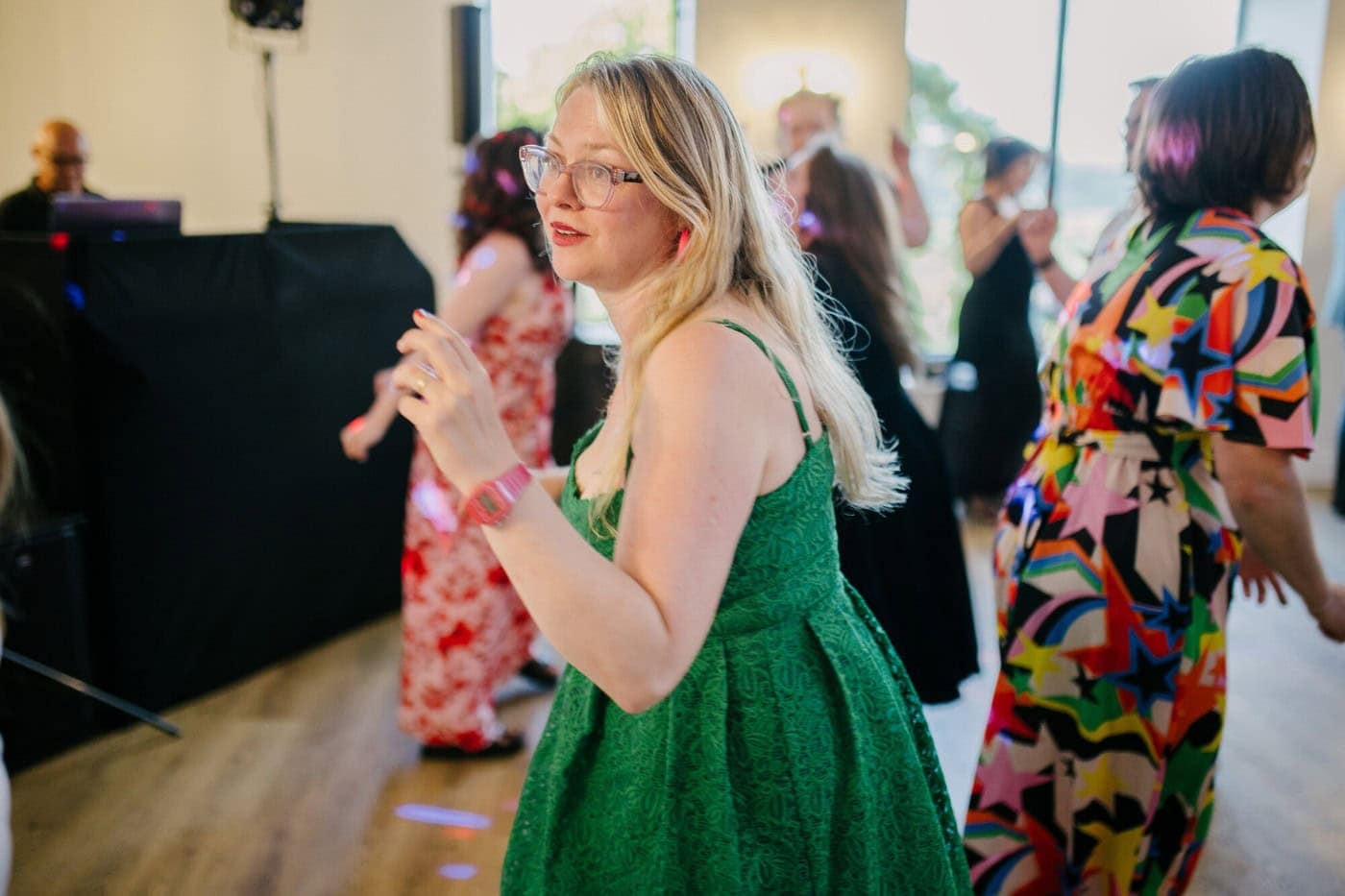 Guest singing along on the dance floor at the evening reception at Danby Castle